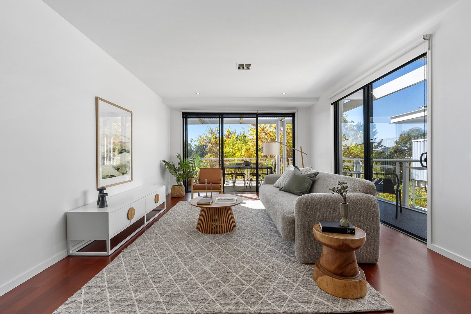 Bright living room with windows on two sides