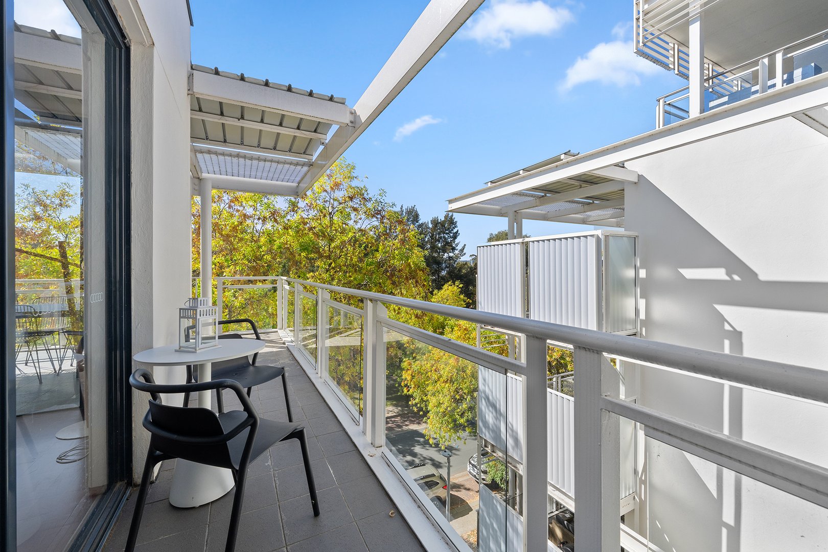 Balcony extending along the apartment