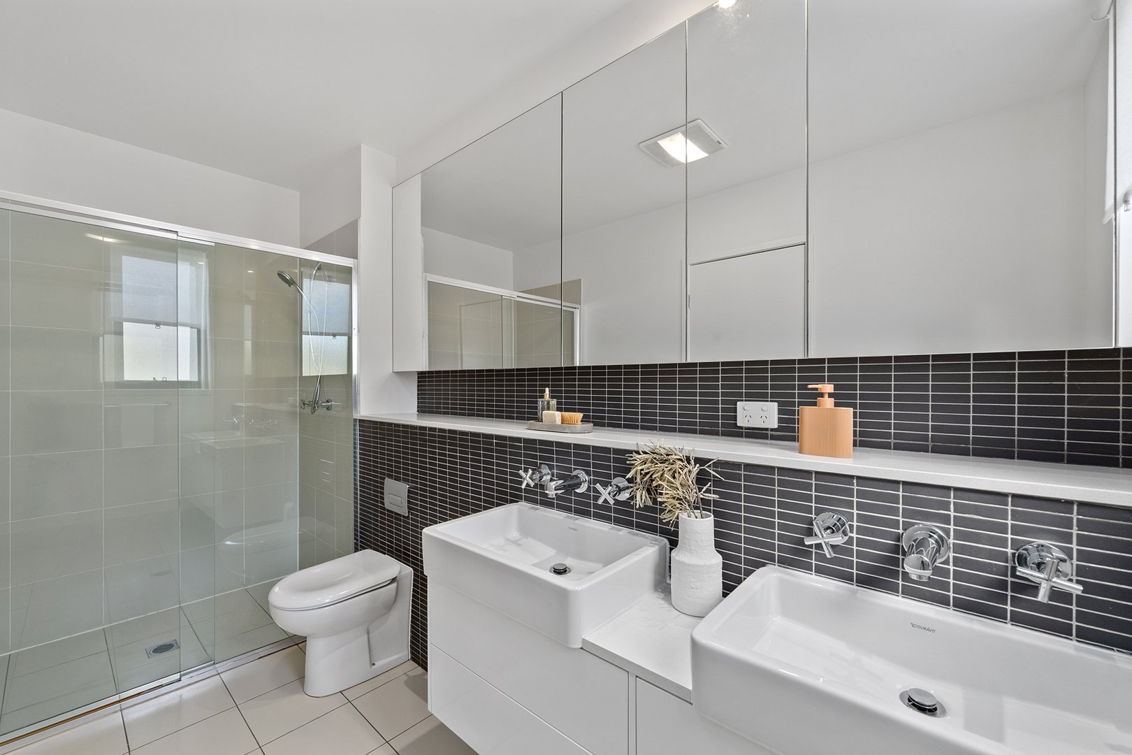 Ensuite with double vanity and shower